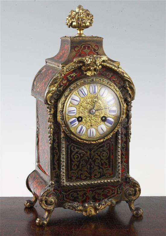 An early 20th century red boulle mantel clock, 12in.